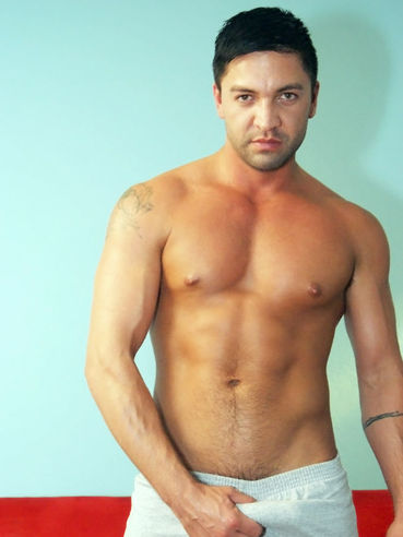 Horny Stud Dominic Pacifico Plays With The Shape Of His Cock In His Shorts Before Setting It Fre