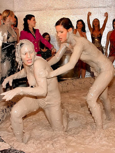 Lora Licious Reveals Her Boobies As She Takes Part In Girl-On Girl Mud Wrestling