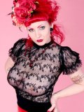 Xanthia Doll Poses In See Through Black Lace Blouse And Red Latex Skirt