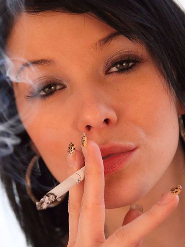 Raven Haired Adrianne Black In Fur Coat Flashes Her Boobs As She Smokes A Cigarette