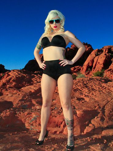 Blonde Haired Alternative Model Lynn Pops Dressed In Black Poses In The Mountains