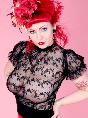 Xanthia Doll Poses In See Through Black Lace Blouse And Red Latex Skirt