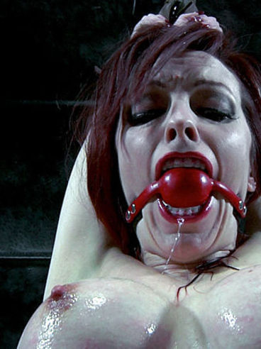 Ball Gagged Slave Redhead Emily Marilyn With Big Round Melons Is Helpless In Restraints