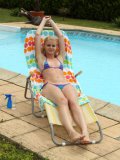 Gorgeous Blonde Samantha Heat Behaves Kinkily Stretching Legs And Playing With Pussy At The Pool