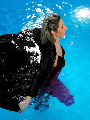 Beautifully Dressed Stocking Babes Hana Black And Daria Glower Swim In The Pool